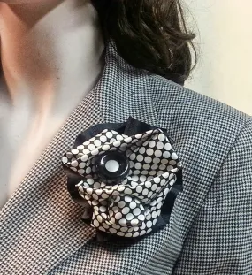 Black and white checked broach